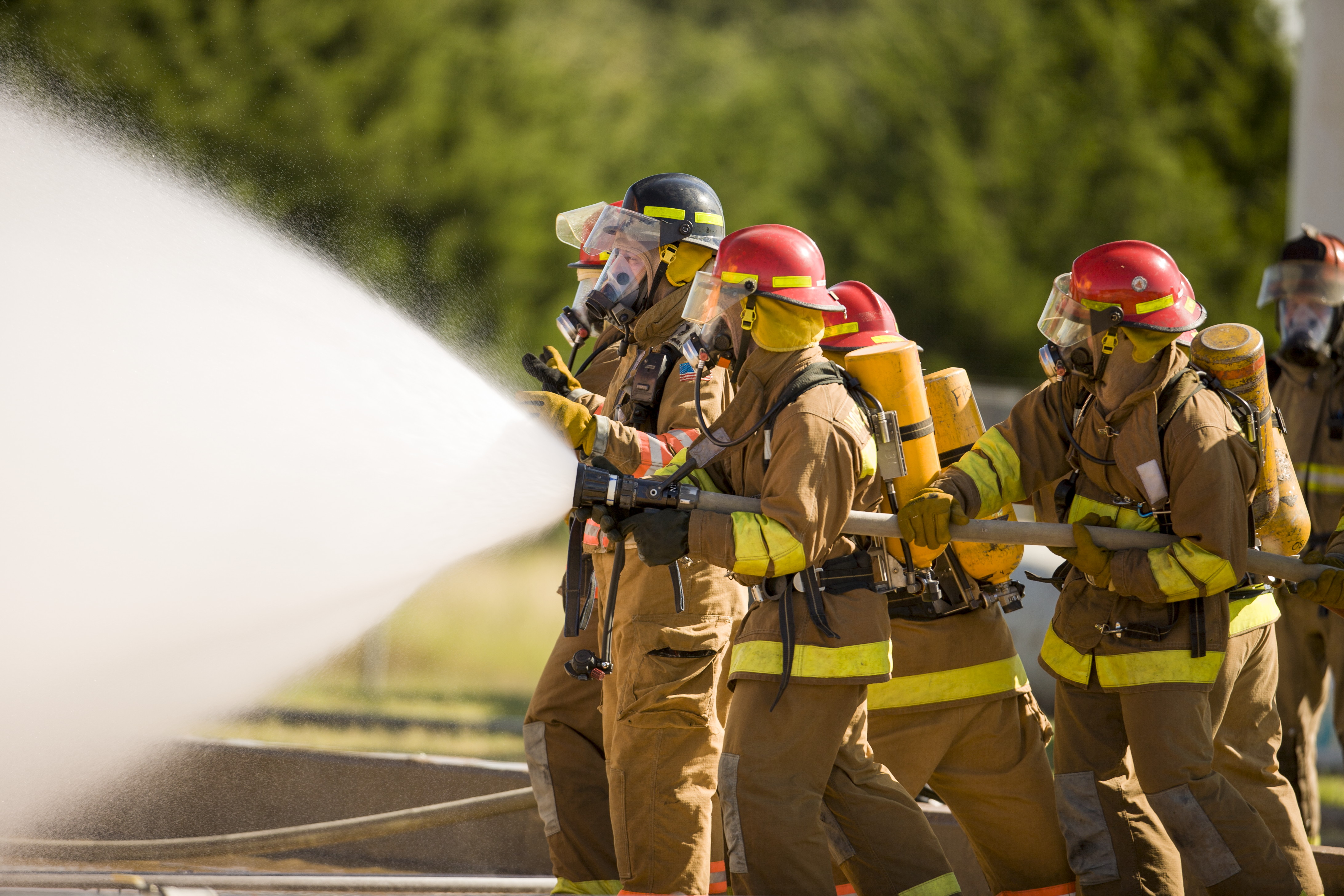 Firefighters spraying water