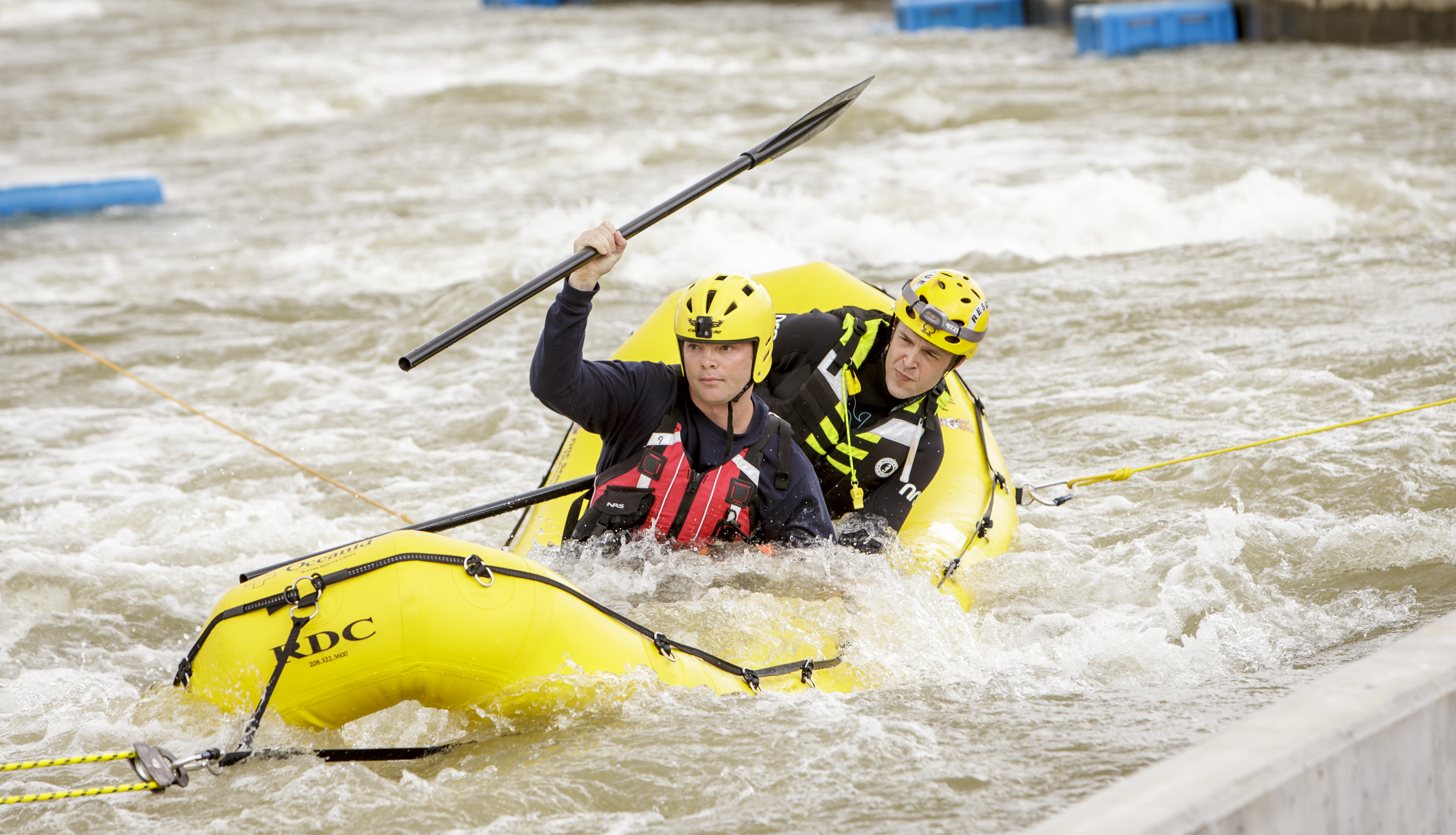 Water rescue team in raft